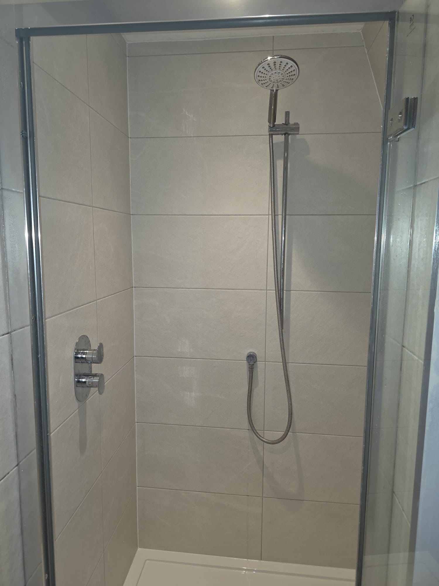 Tiling and new shower doors in Hersham